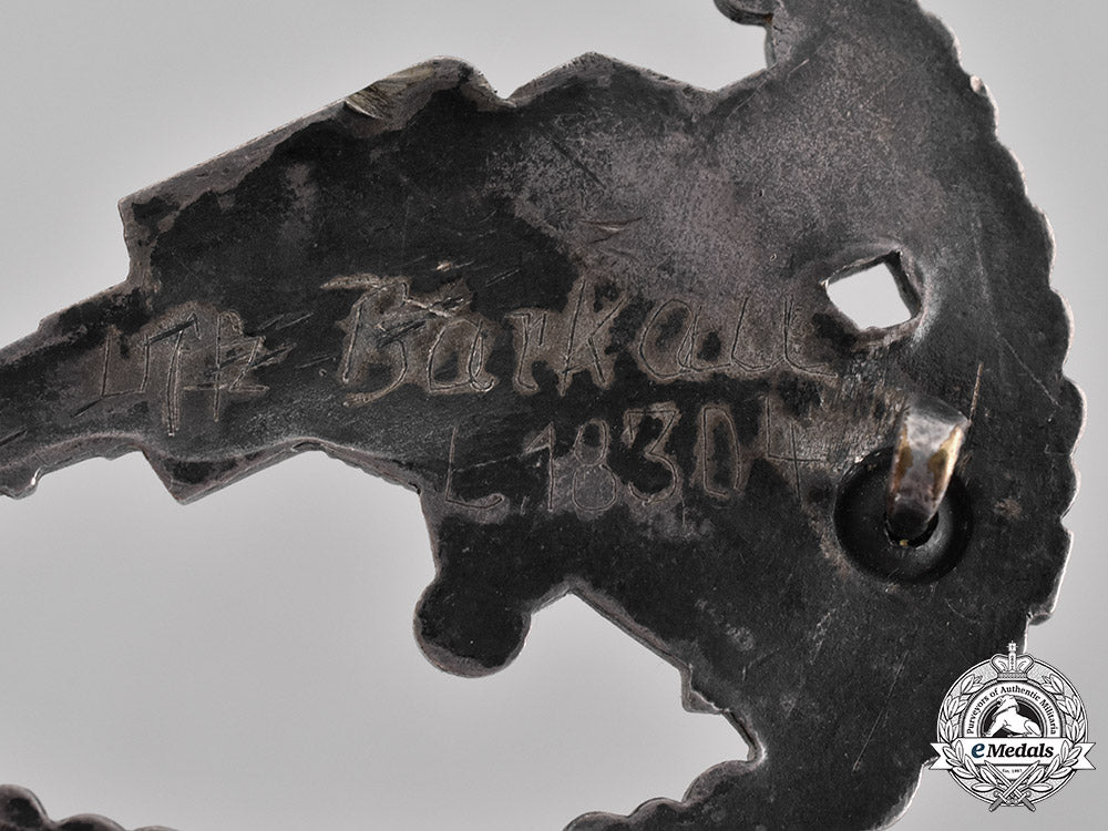 germany,_luftwaffe._a_denazified_luftwaffe_flak_badge_and_presentation_case_belonging_to_unteroffizier_barkau_m181_8165