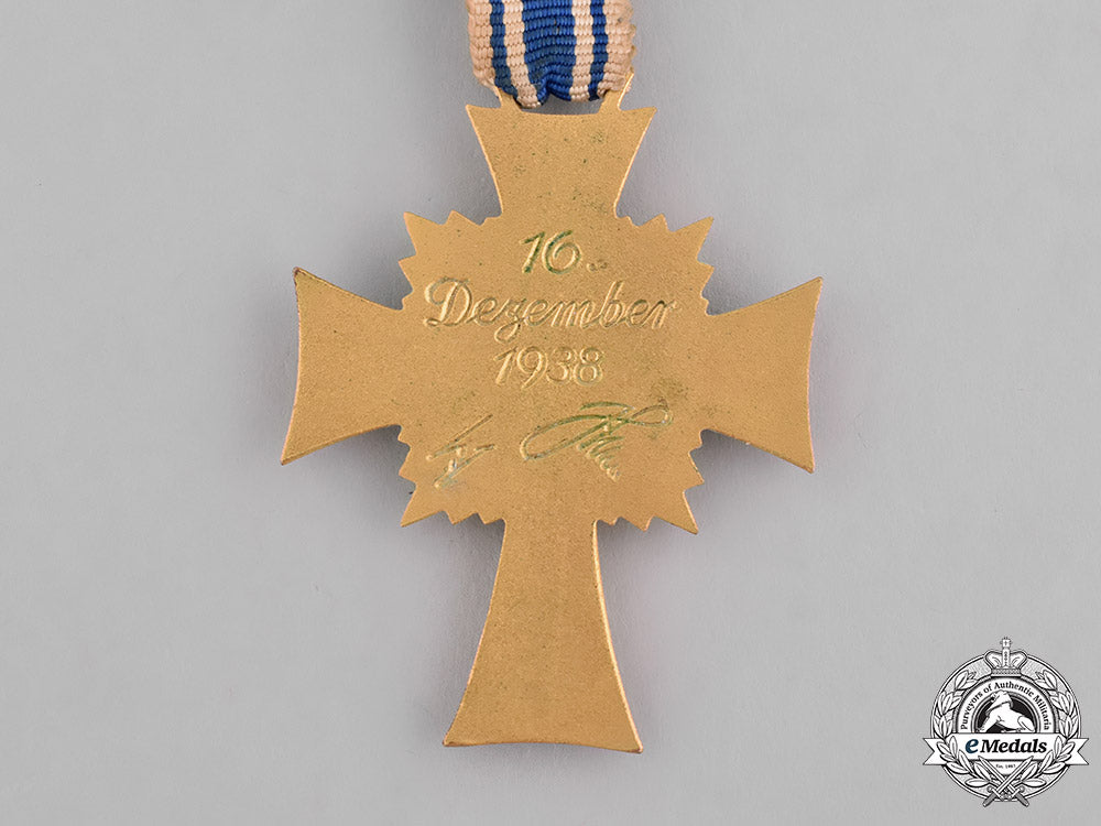 germany,_third_reich._a_cased_honour_cross_of_the_german_mother,_gold_grade,_by_carl_poellath_m181_8221