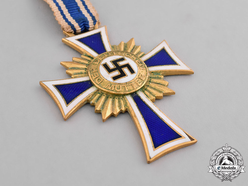 germany,_third_reich._a_cased_honour_cross_of_the_german_mother,_gold_grade,_by_carl_poellath_m181_8222