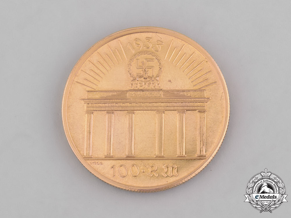 germany,_third_reich._a_post-_war_argentinean-_struck_gold100_reichsmark_coin_m181_8244