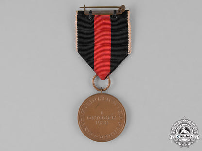 germany,_third_reich._a_sudetenland_medal_with_clasp_and_case_m181_8316