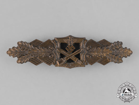 germany,_wehrmacht._a_close_combat_clasp,_bronze_grade,_by_arbeitsgemeinschaft_metall_und_kunststoff_m181_8490