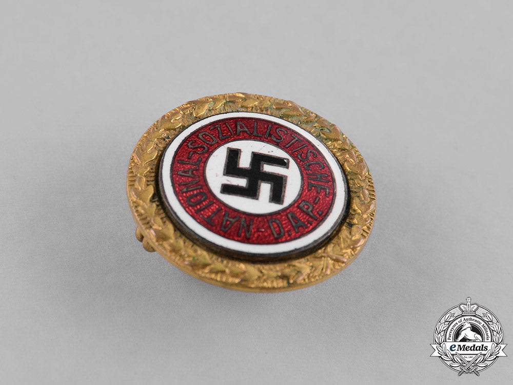 germany,_nsdap._a_golden_party_badge_awarded_to_hertha_rauch,_by_josef_fuess_m181_8732