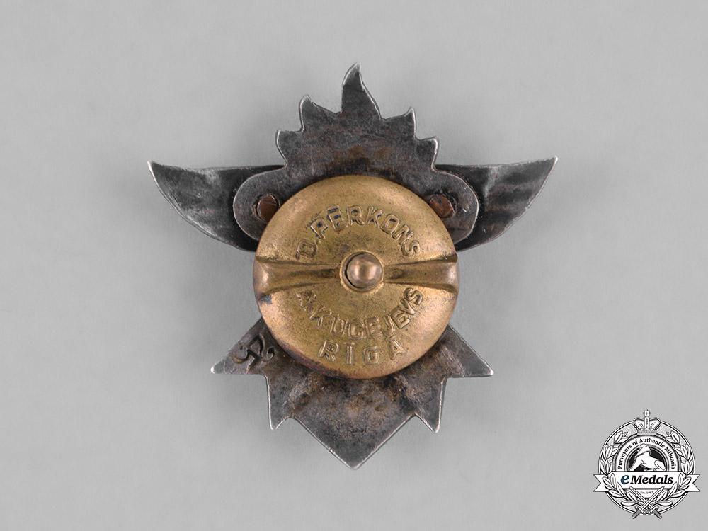 latvia,_first_republic._a_latvijas_vanagi(_latvian_hawks)_member’s_badge,_with_documents,_by_o._pērkons&_a._kucejevs_m181_9101