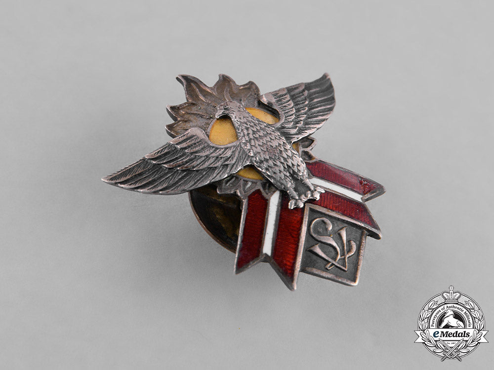 latvia,_first_republic._a_latvijas_vanagi(_latvian_hawks)_member’s_badge,_with_documents,_by_o._pērkons&_a._kucejevs_m181_9103