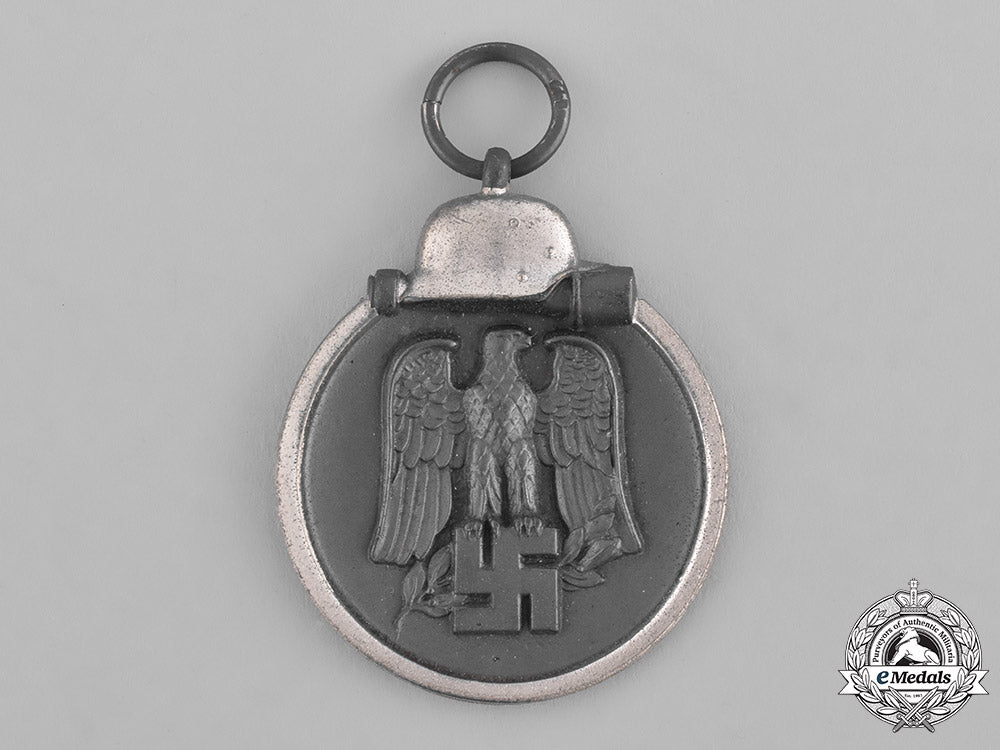 germany,_heer._a_medal_for_the_winter_campaign_in_russia1941/1942_and_manufacturer’s_packet,_by_e._ferd_weidmann_m181_9335