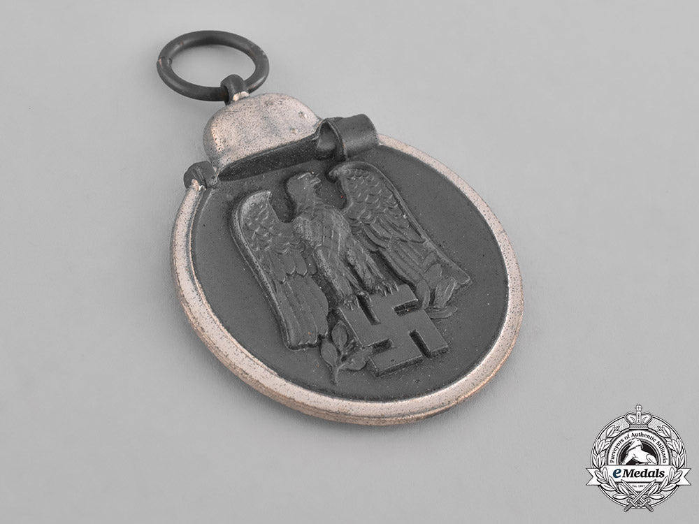 germany,_heer._a_medal_for_the_winter_campaign_in_russia1941/1942_and_manufacturer’s_packet,_by_e._ferd_weidmann_m181_9337