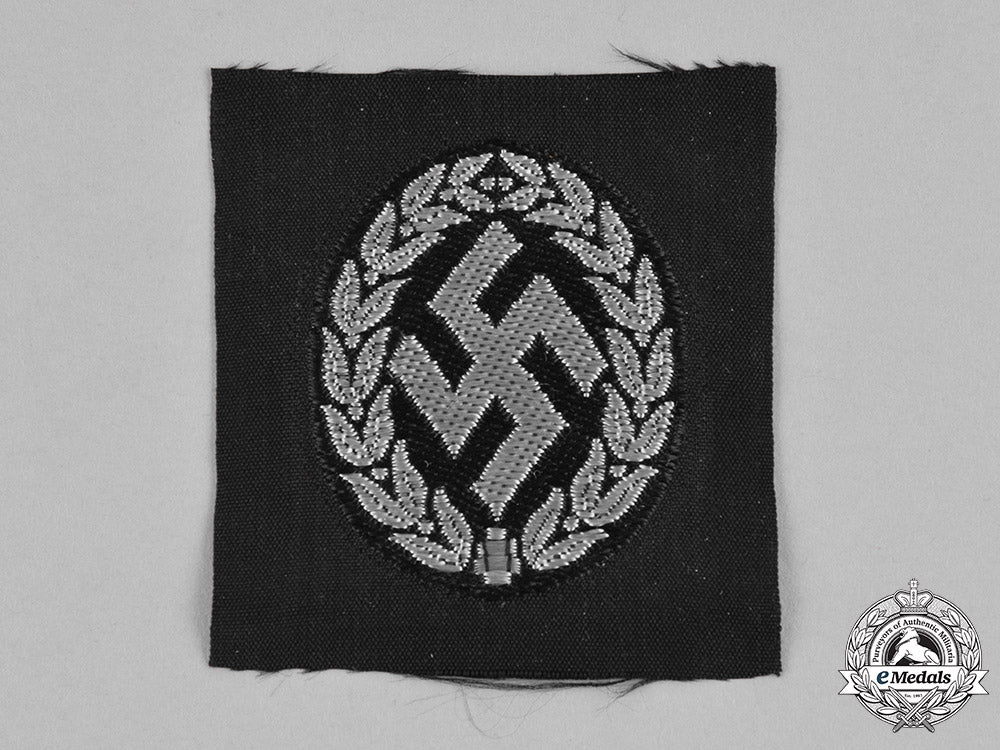 germany,_ordnungspolizei._a_schutzmannschaft(_auxiliary_police)_collaborator’s_m43_cap_insignia_m182_0316