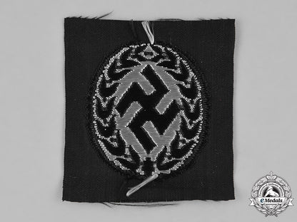 germany,_ordnungspolizei._a_schutzmannschaft(_auxiliary_police)_collaborator’s_m43_cap_insignia_m182_0317