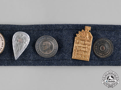 germany,_third_reich._a_souvenir_belt_featuring_day_badges_m182_0425