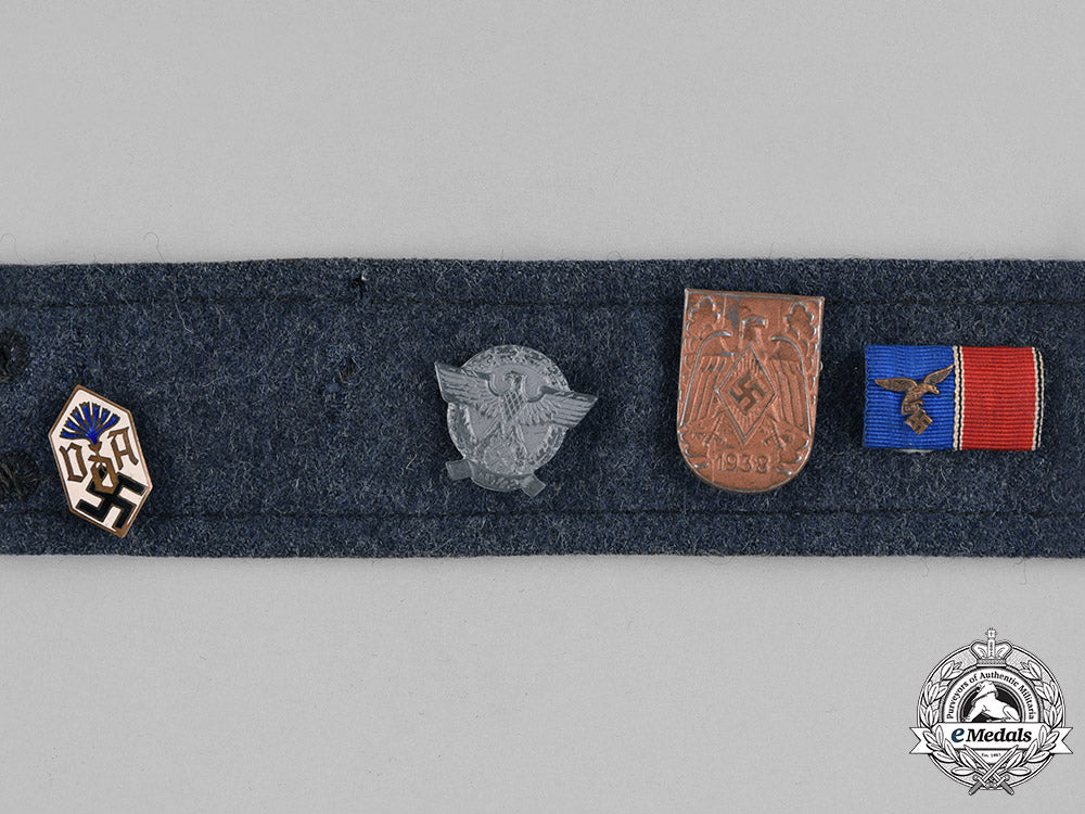 germany,_third_reich._a_souvenir_belt_featuring_day_badges_m182_0429