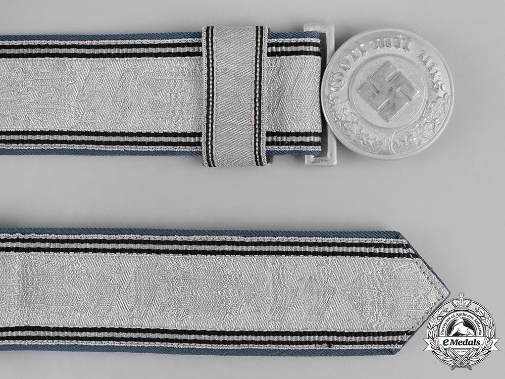 germany,_ordnungspolizei._a_police_officer’s_belt_buckle_by_assmann_with_a2_nd_pattern_ss_brocade_belt_m182_0853