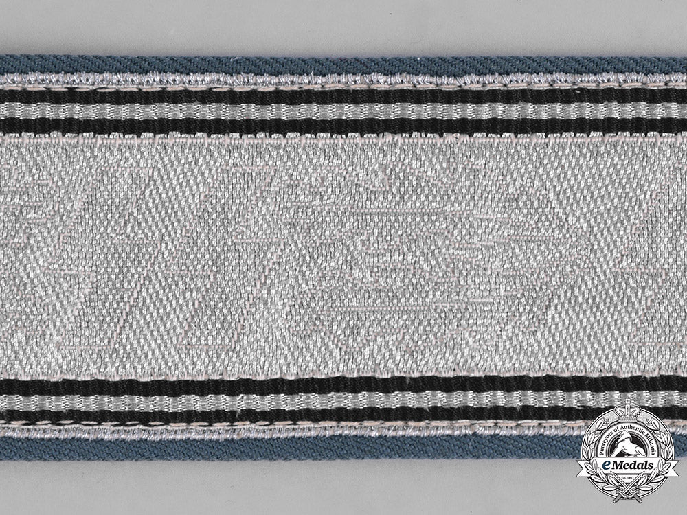 germany,_ordnungspolizei._a_police_officer’s_belt_buckle_by_assmann_with_a2_nd_pattern_ss_brocade_belt_m182_0855