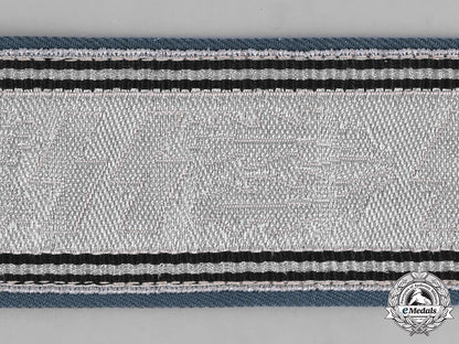 germany,_ordnungspolizei._a_police_officer’s_belt_buckle_by_assmann_with_a2_nd_pattern_ss_brocade_belt_m182_0855