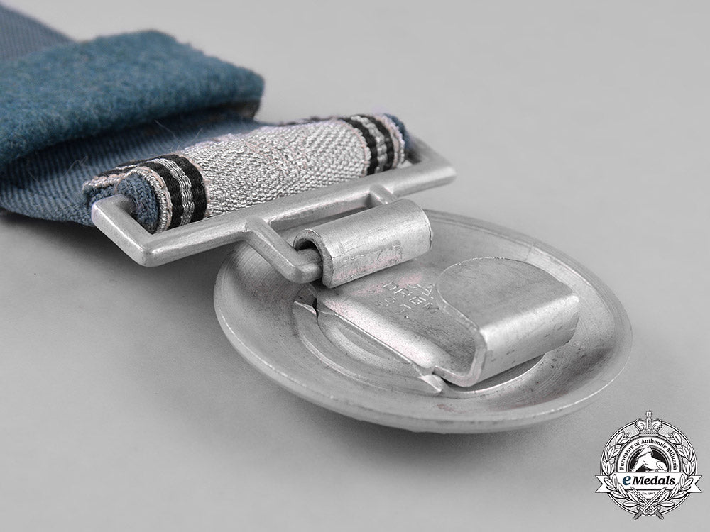 germany,_ordnungspolizei._a_police_officer’s_belt_buckle_by_assmann_with_a2_nd_pattern_ss_brocade_belt_m182_0856