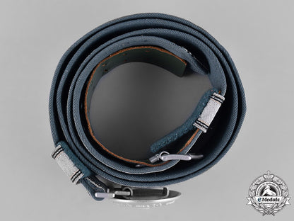 germany,_ordnungspolizei._a_police_officer’s_belt_buckle_by_assmann_with_a2_nd_pattern_ss_brocade_belt_m182_0859