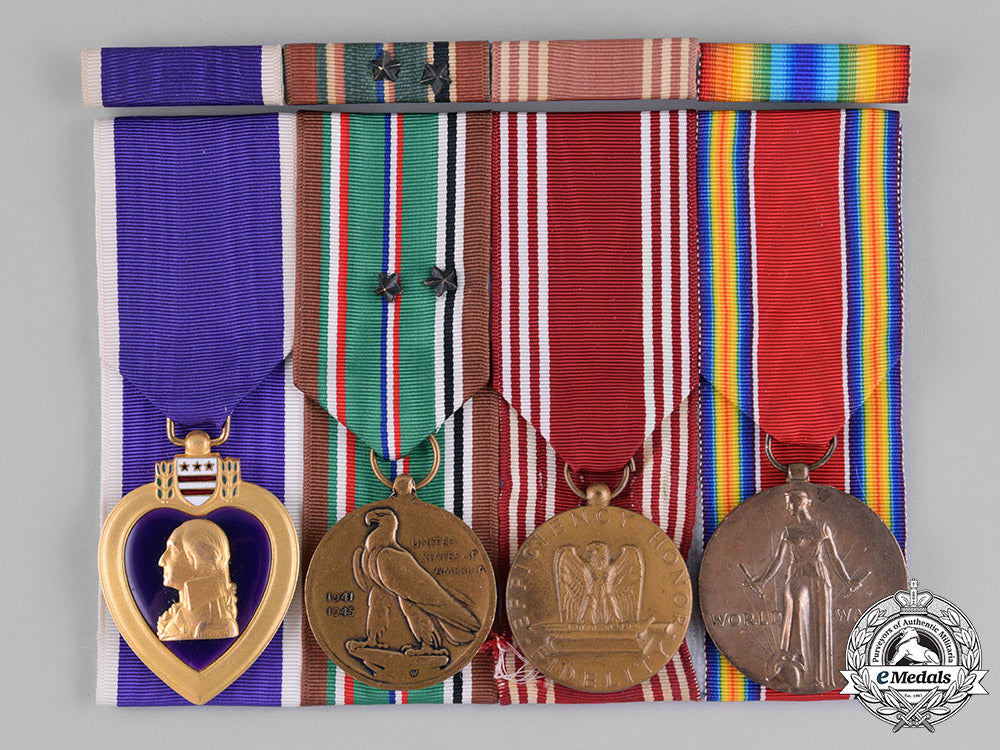 united_states._a_purple_heart_group_of_four,_private_john_b._perkins(_canadian),1944_m182_1232