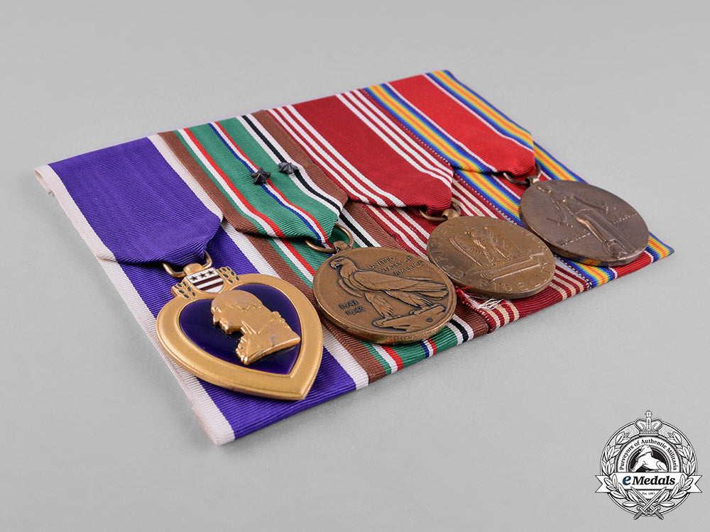 united_states._a_purple_heart_group_of_four,_private_john_b._perkins(_canadian),1944_m182_1234