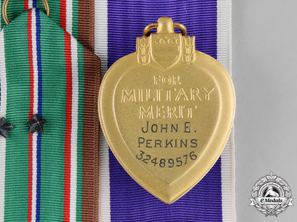 united_states._a_purple_heart_group_of_four,_private_john_b._perkins(_canadian),1944_m182_1235