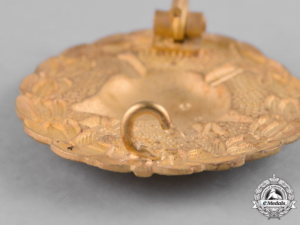 germany,_imperial._a_gold_grade_wound_badge_with_miniature_m182_1678