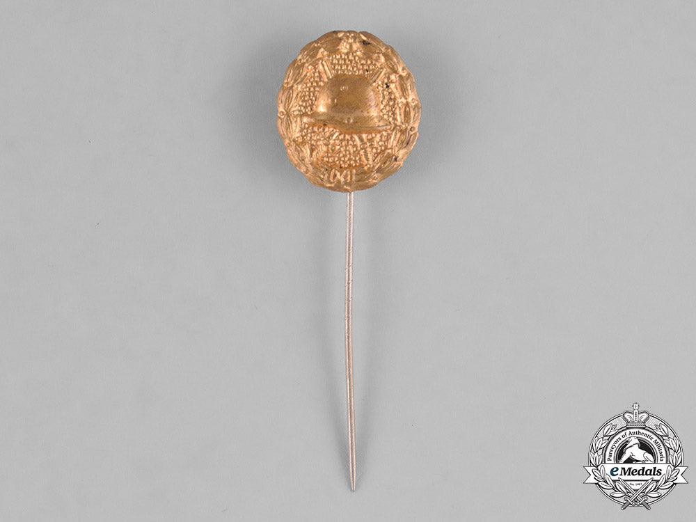 germany,_imperial._a_gold_grade_wound_badge_with_miniature_m182_1680