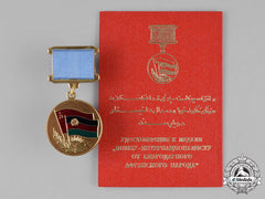 Afghanistan, People's Democratic Republic. An International Fighter Medal With Booklet
