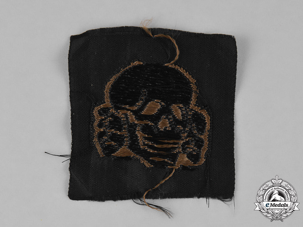 germany,_ss._a_rare_brown_waffen-_ss_cap_skull_for_m43_field_cap_m182_2037_1_1_1