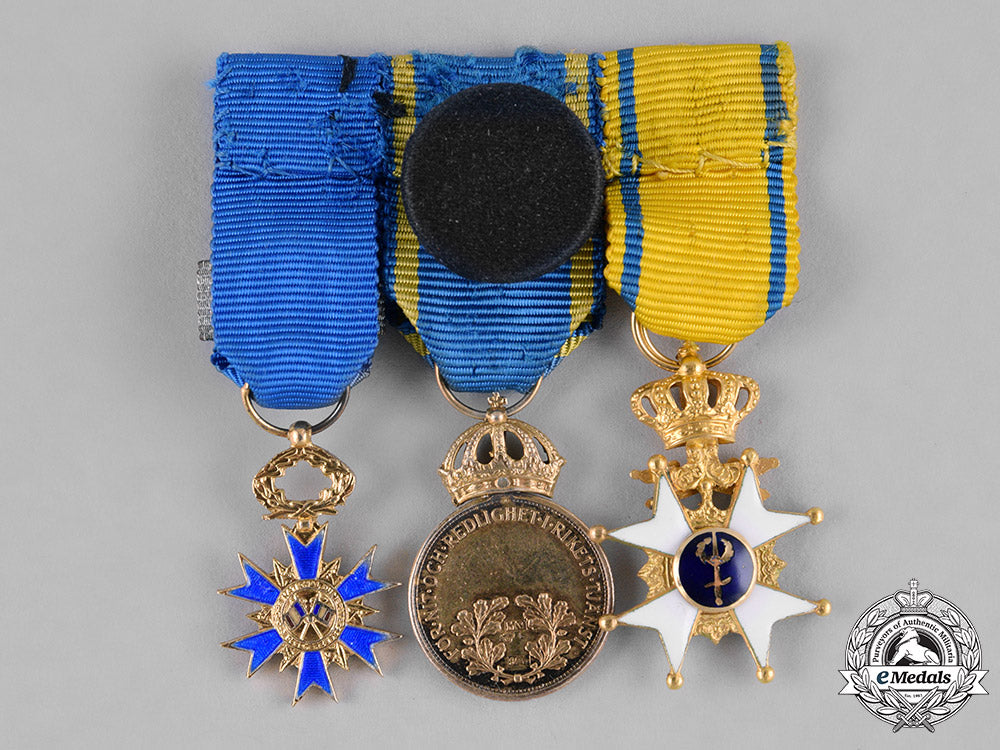 sweden,_kingdom._a_fine_order_of_the_sword_miniature_group_in_gold,_c.1975_m182_2790_1