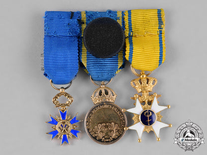 sweden,_kingdom._a_fine_order_of_the_sword_miniature_group_in_gold,_c.1975_m182_2790_1