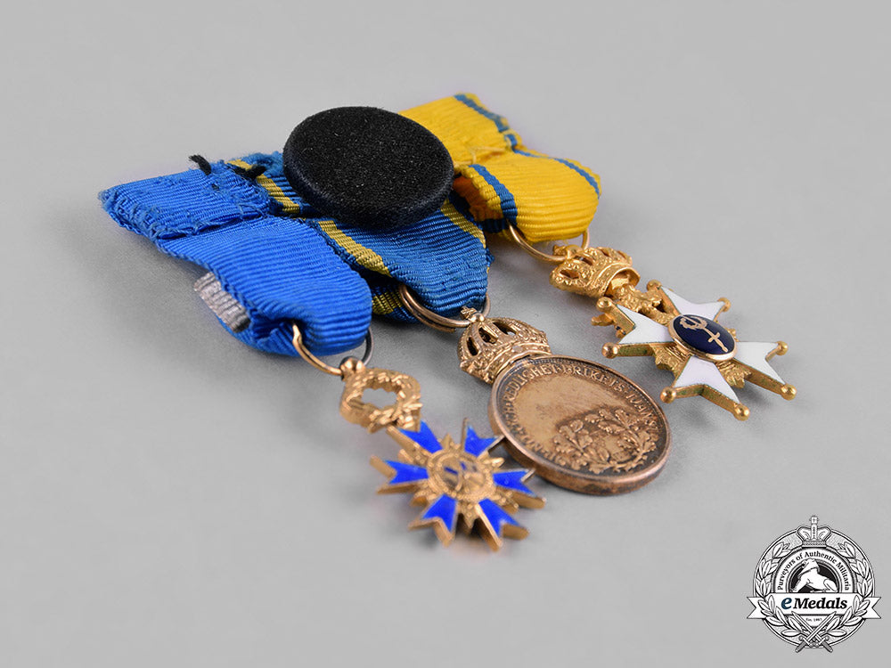 sweden,_kingdom._a_fine_order_of_the_sword_miniature_group_in_gold,_c.1975_m182_2792_1