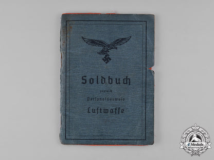 germany,_luftwaffe._a_pair_of_documents_belonging_to_knight’s_cross_recipient_martin_körner_m182_3997_1_1
