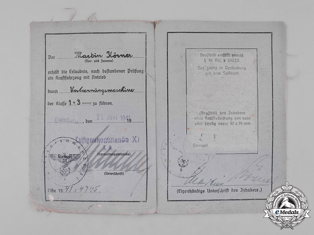 germany,_luftwaffe._a_pair_of_documents_belonging_to_knight’s_cross_recipient_martin_körner_m182_4004_1_1