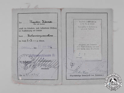 germany,_luftwaffe._a_pair_of_documents_belonging_to_knight’s_cross_recipient_martin_körner_m182_4004_1_1