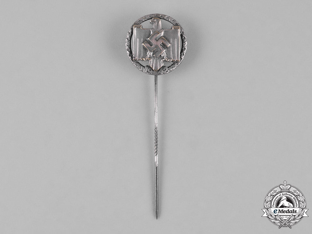 germany,_third_reich._a_national_socialist_league_of_the_reich_for_physical_exercise_achievement_badge_in_silver,_c.1942_m182_4972