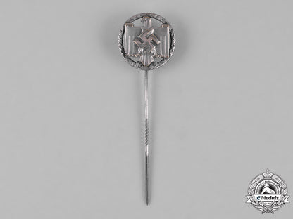 germany,_third_reich._a_national_socialist_league_of_the_reich_for_physical_exercise_achievement_badge_in_silver,_c.1942_m182_4972