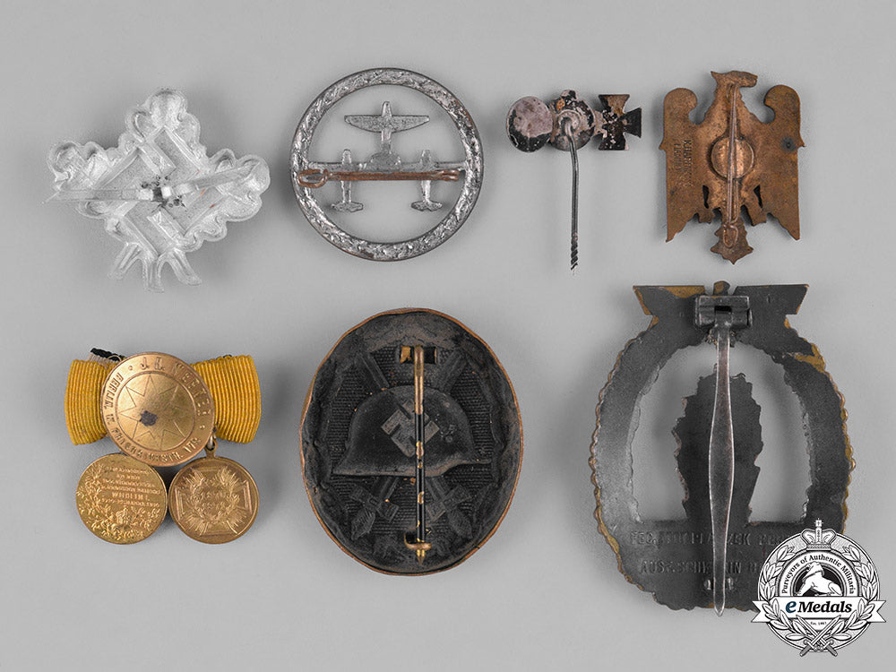 germany,_third_reich._a_group_of_second_war_period_badges&_insignia_m182_5186