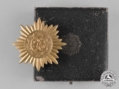 Germany, Wehrmacht. A Cased Eastern People’s Bravery Decoration, First Class Gold Grade