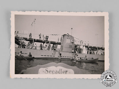 germany,_kriegsmarine._a_certificate_of_issue_for_a_u-_boat_war_badge_to_obergefreiter_paul_hartwig_m182_5675