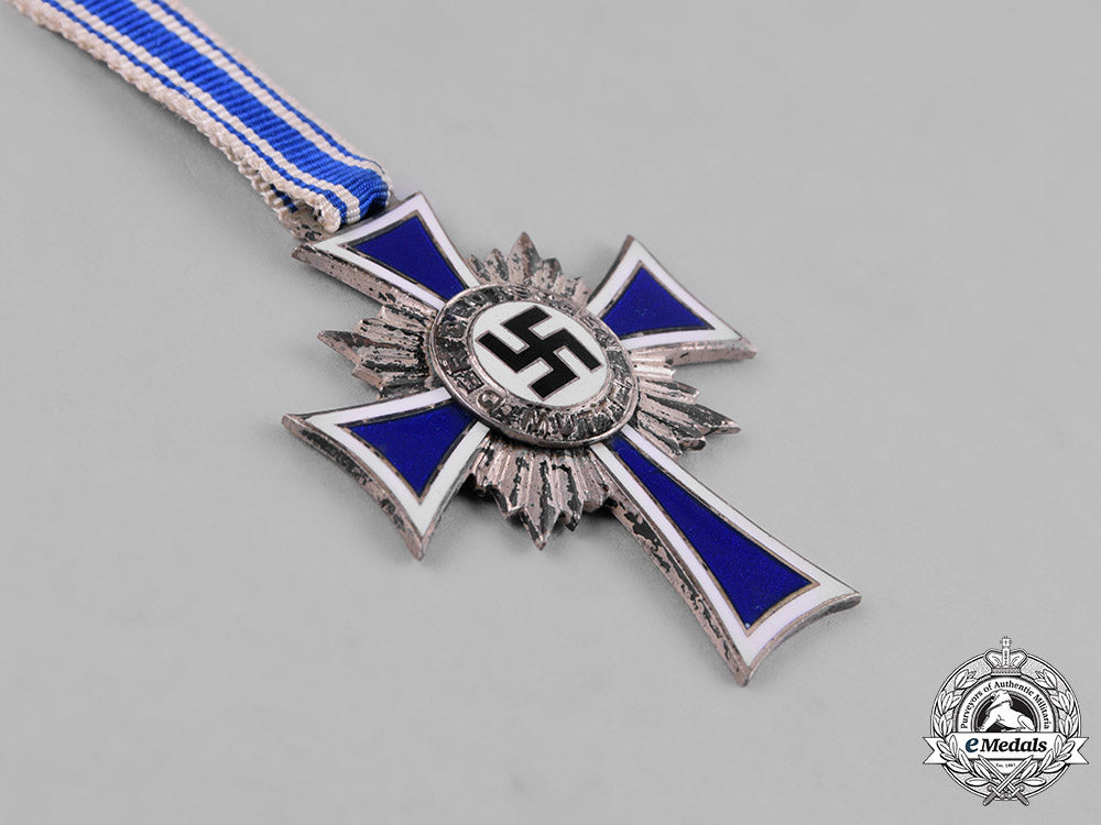 germany,_third_reich._a_pair_of_silver_grade_honour_crosses_of_the_german_mother_m182_5764