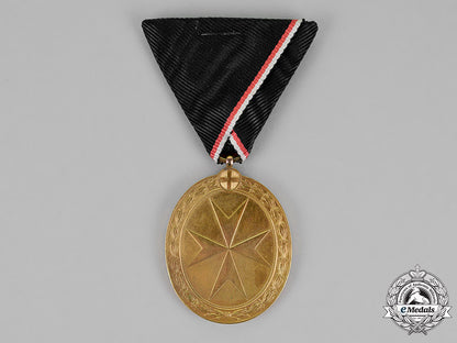 austria,_empire._an_order_of_the_knights_of_malta_gold_merit_medal,_c.1918_m18_5345