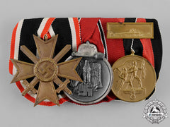 Germany. A Medal Bar With Three Medals, Awards, And Decorations
