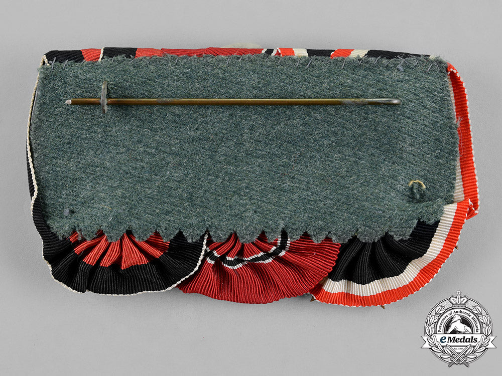 germany._a_medal_bar_with_three_medals,_awards,_and_decorations_m18_5357
