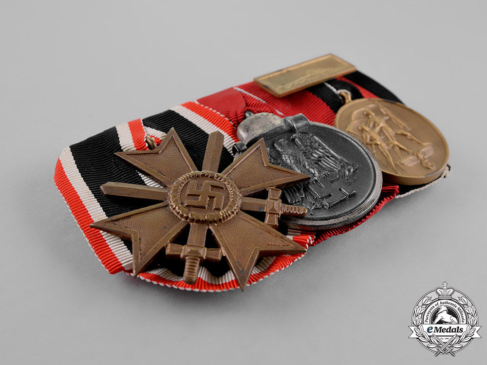 germany._a_medal_bar_with_three_medals,_awards,_and_decorations_m18_5359