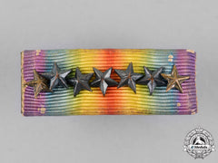 United States. A First War Victory Medal Ribbon Bar With Seven Bronze Stars