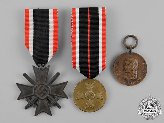 germany._a_grouping_of_three_medals,_awards,_and_decorations_m18_8268