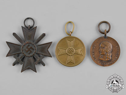 germany._a_grouping_of_three_medals,_awards,_and_decorations_m18_8269