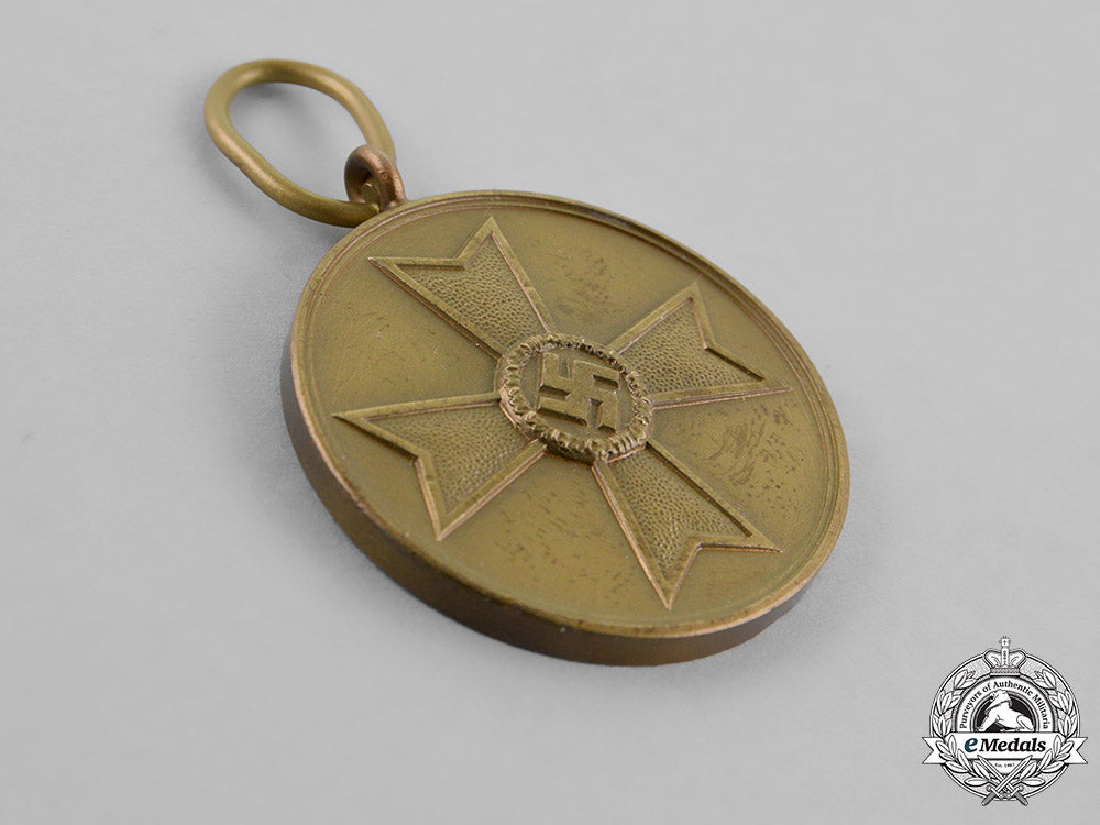 germany._a_grouping_of_three_medals,_awards,_and_decorations_m18_8272