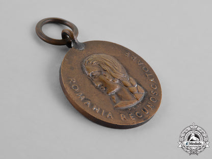 germany._a_grouping_of_three_medals,_awards,_and_decorations_m18_8273