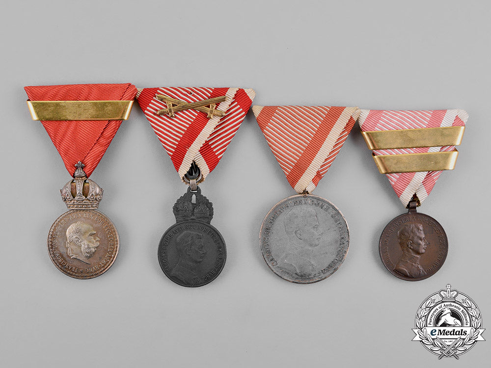 austria,_empire._a_grouping_of_four_bravery_and_merit_medals_m18_8331
