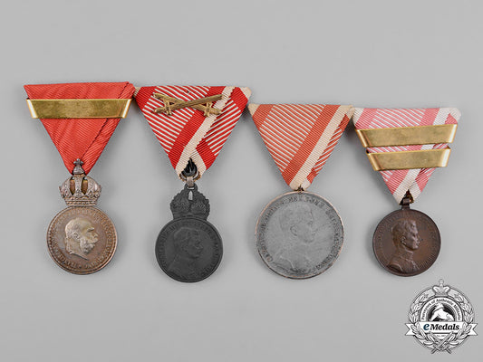 austria,_empire._a_grouping_of_four_bravery_and_merit_medals_m18_8331